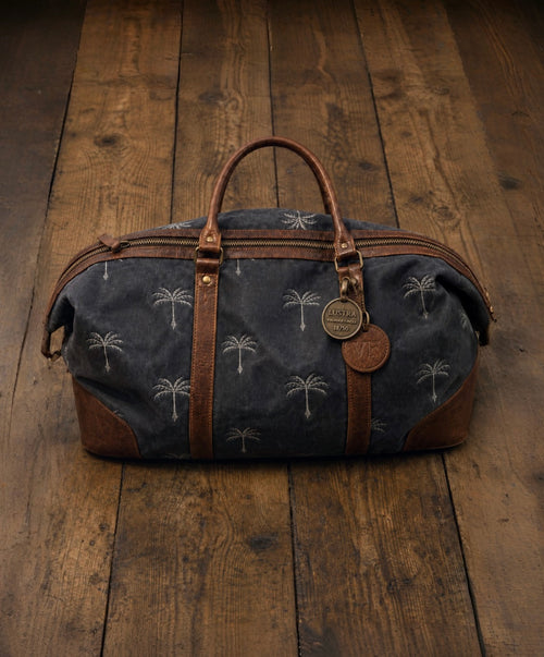 The Hedonist anthracite waxed canvas weekender bag with cognac leather